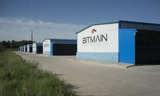 A row of mining rigs are ready for installation in a data center.